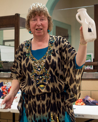 Julie displaying tacky portable urinal