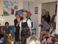 Paula, in the classically tacky umbrella hat