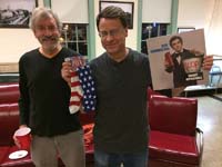 John Heins, displaying his entry and the prize he won