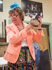 Julie displaying KISS mug