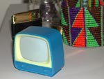 Plastic television with fine art slides